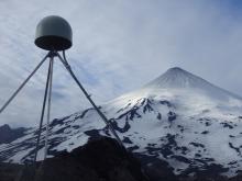 Dark, ash-covered snow near the summit of Shishaldin Volcano in the Aleutians is evidence of ongoing low-level eruptive activity near PBO’s AV37 GPS station. (Photo/Ryan Bierma, UNAVCO)